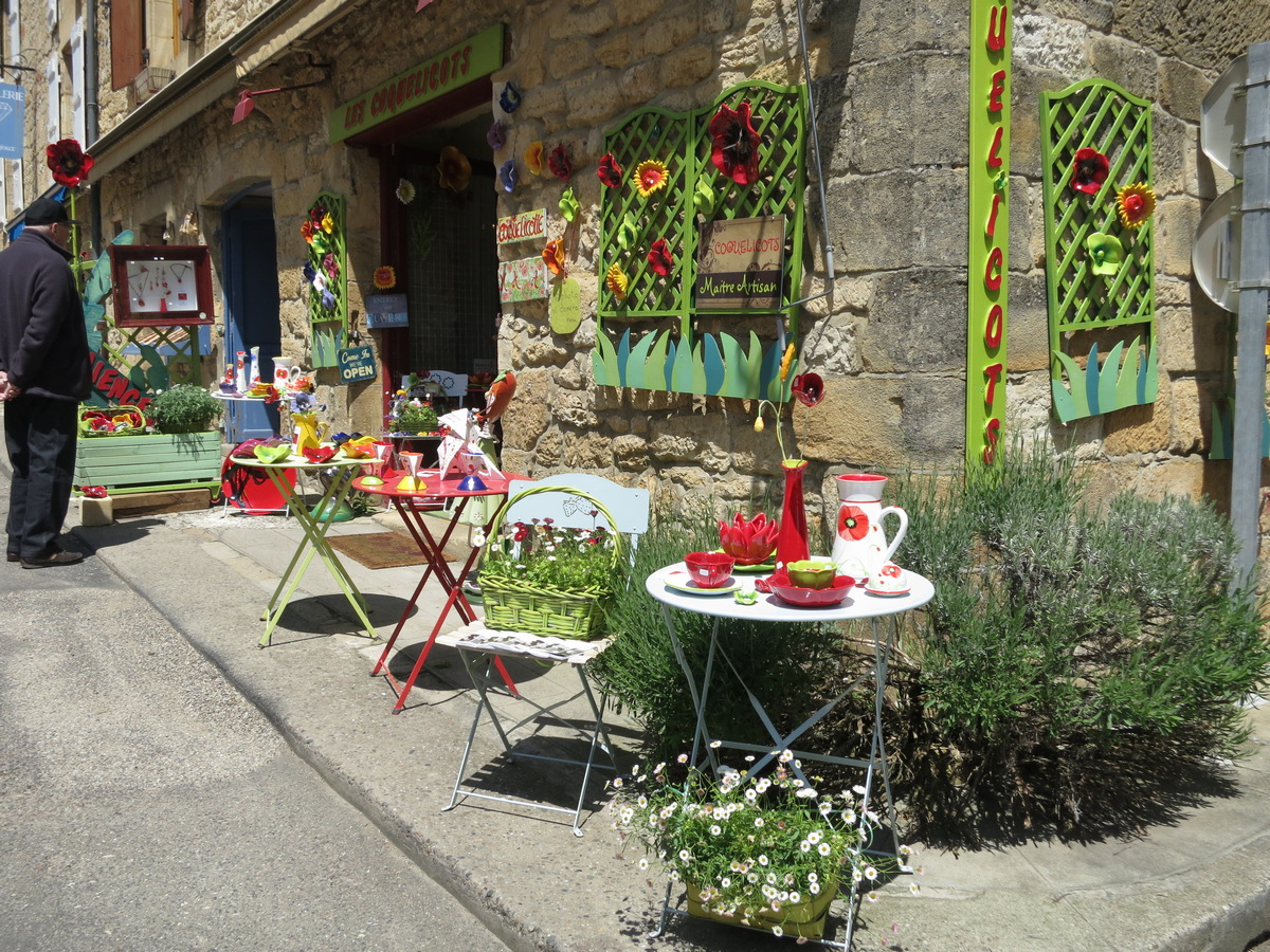 Sarlat Saturday market — local produce, foie gras, walnut wine, cheese